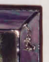 Close-up of Picture Frame Charm