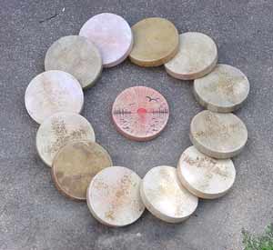 The 13 Soul Medicine Drums on the Parking Lot