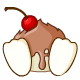Milk chocolate icing poured over a white chocolate sponge, topped with white chocolate feet and a cherry.