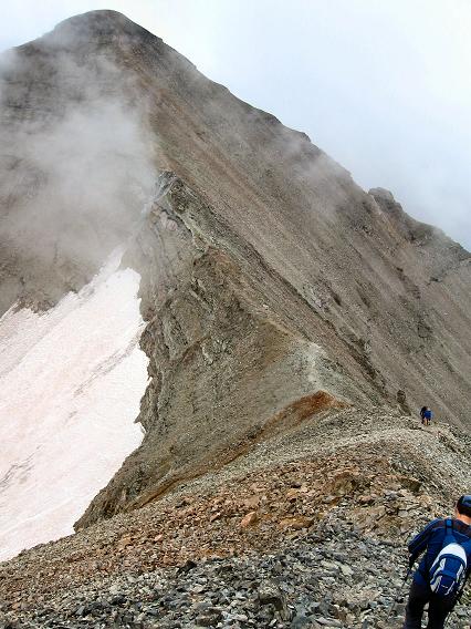Saddle between Conundrum Peak and Castle Peak - note how steep the snowfield slope is