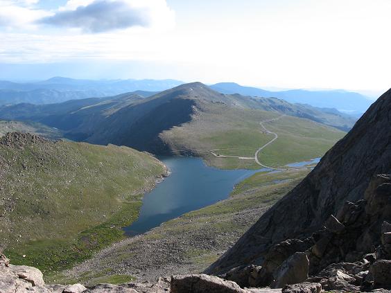 View of the Summit Lake parking lot from high on Mt Evan's west ridge