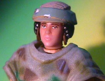 A close-up of the head, with the helmet on.