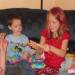 This is my youngest daughter, Sydney's, birthday, November 2007.  She has red hairspray on her hair.  The orb is on the left.