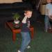 This is a picture of my son and an orb behind him.  This was taken in May 2007 at our new home in Oregon. We had just moved in a couple weeks before.  There are a few different orbs in the picture.