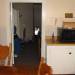 This picture was taken in May 2007, while we were moving into our new house.  I was snapping pictures around the house and caught an orb and what looks like a ghostly hand in the mirror on the far wall.  This is the bedroom that my husband and I hear the door moving and the closets open on their own. 
