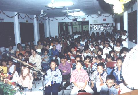 About 200-225 kids and parents were listening to the Gospel