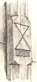Zandlopermotief en jaartal 1660, op stiepel van het erve Olde Geerts te Brecklenkamp (Gem. Denekamp). Ongeschilderd eikehout. Getekend in 1958. Nu verdwenen.