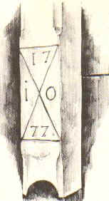 Middeler van boerderij in Oonk in Elsen (gem. Markelo). Initialen (Jan Oonk), aangebracht jaartal 1777. Zandloper als beheersend motief. Kleuren: mat0geel, donkergroen. In de negentiende eeuw toegepast. Getekend in 1961.