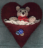 teddy in heart huggy