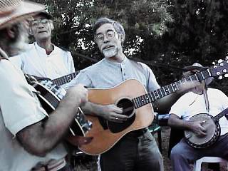 My arm, Ray, Menscher & Yitz at the 1999 Picnic