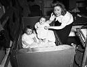 War Bride With Babies in Cribs