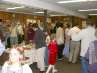 Church members congregate in Friendship Hall after a the morning service