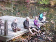 [kids fishing on a dock]