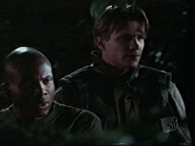 Leonard as Forrest in his army digs alongside 'Riley', played by Marc Blucas.