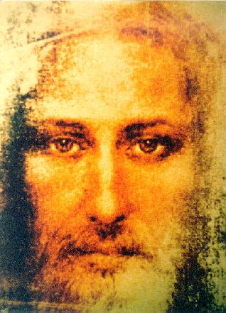 A color photo of Jesus materilised from a b/w shroud of turin