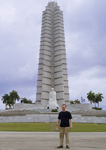 Havana,Revolutionary Square,in front of Jose Marti's statue -father of Cuban idealism and national hero killed in 1895 fighting against Spanish- The tower,about 120m high on the background however is characteristic of the ex communist Soviet  concept regarding architecture of national monuments....nowadays  is used as station for communication antenas as well...