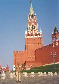 at Red Square,with Kremlin wall  and clock tower on the background,nearby Lenin's underground mausoleum where his body is preserved in glass show case exhibited to public.Photography is strictly forbidden while visitors are tightly watched for unrespectfull behaviour by the guards and  urged  to nonstop move around the coffin till the exit