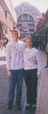 Meg & Joe in front of the Wintergardens, wearing their donor-signed T-shirts.