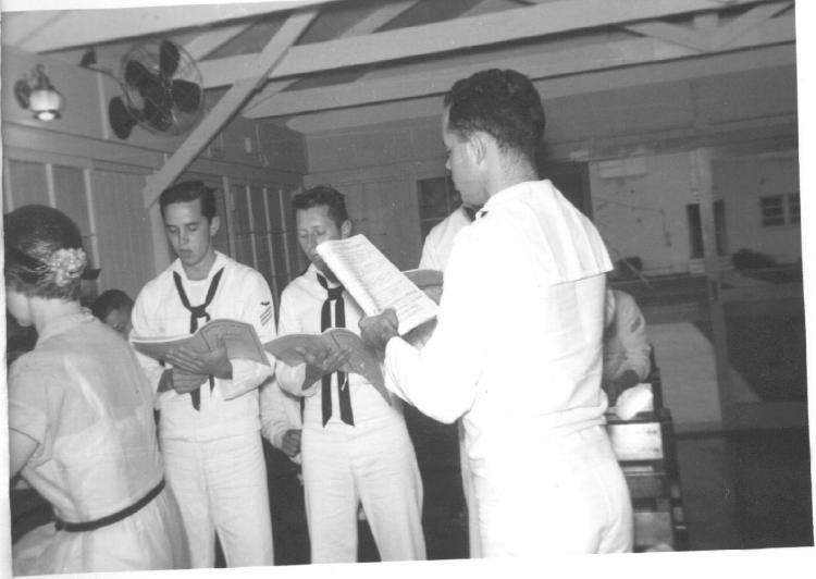 Directing choir in Navy