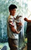 Vince carrying a Koala bear during vacation in Goldcoast Australia
