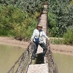 Vicki crossing San Juan on bridge