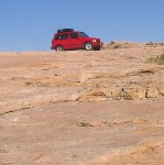 Sidekick parked on slickrock.
