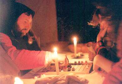 Sven and Ragnar playing hnefatafl at a feast, Wagga Wagga 1993.