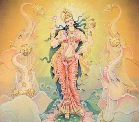 Mother Lakshmi, the Goddess of Fortune. She is normally seen dispensing coins as money is also considered Lakshmi.