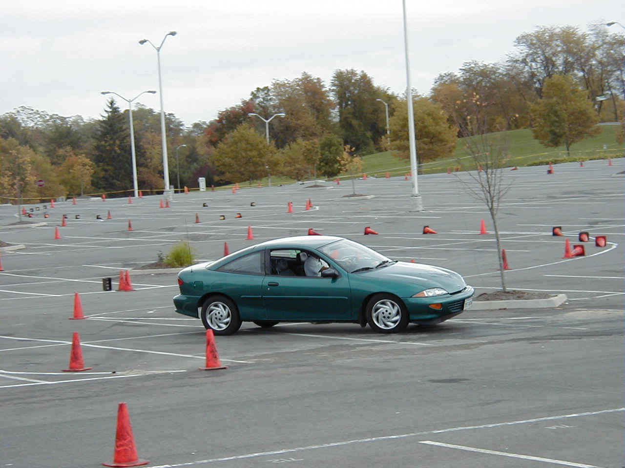 HS, 1st in class, Tommy Arboneaux, 99 RENTAL Cavalier LS, best time:  40.672