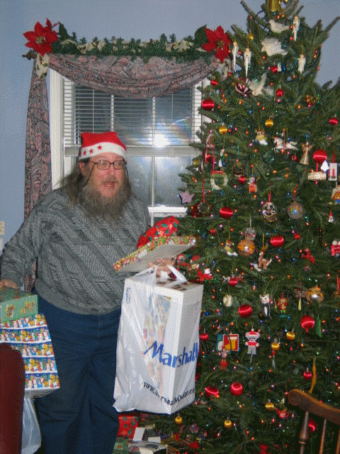 Charlie Klein saddles up with toys and winter clothing for delivery to a local homeless shelter. Photo by Len Ignatowski