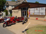 Some of the bikes that showed up.  Notice our sign on the building?