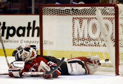 Marty Brodeur didn't stop this Trevor Linden shot.  He got schooled.
