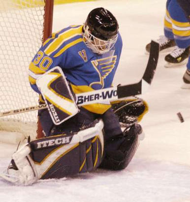 Chris Osgood makes the stop