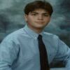 Blue shirt, black necktie