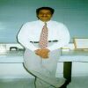 White Shirt, Tan Slacks