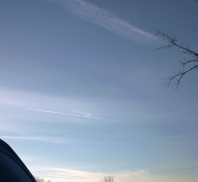 December 11, 2001..There is a jet in this photo as well as trails.