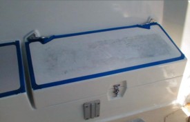 Applying treadmaster, the floor has been painted at this point