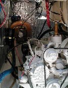 Engine room with Kubota engine, hot water heater and all the rest