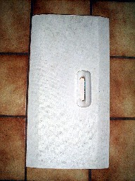Grubby, old, cloth-covered door (galley)