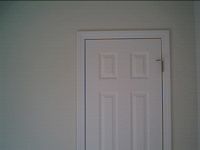 all doors hung plumb, with even gaps, a solid strike, shimmed in at least 7 places, and nailed with 2.5 inch 15 ga. nails :)