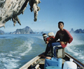 Longtail fisherman, Phang Nga Bay (Thailand)
