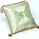 sage green ring pillow with tassels