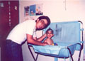 My dad giving me a bath