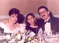 Me and my parents at an aunt's wedding. 1996.
