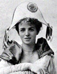 Maude Adams seated wearing hat