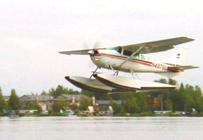 Pontoon plane on watery runway in the largest seaplane airport in the world