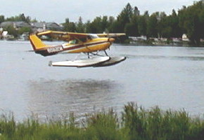 Pontoon plane on watery runway in the largest seaplane airport in the world