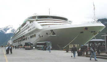 Note the drop-down platform near the bow. That's where the guy stands who tells the captain how close he is to the dock.