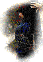 Kathy leaning on pole