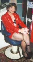Cynammin in black and red...sitting in a chair